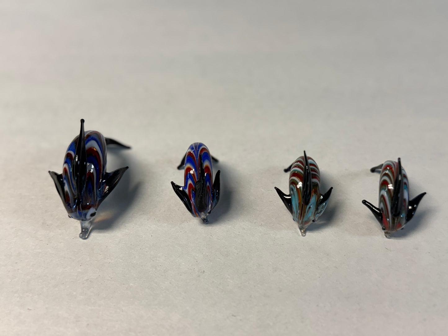 Set of Four Hand-Blown Miniature Art Glass Dolphins