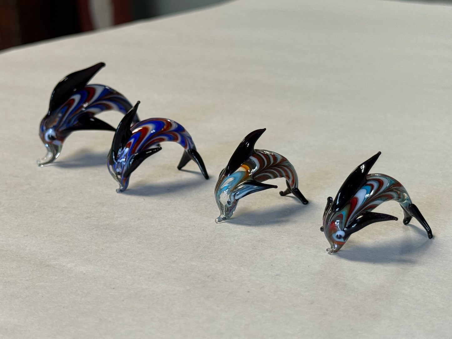 Set of Four Hand-Blown Miniature Art Glass Dolphins