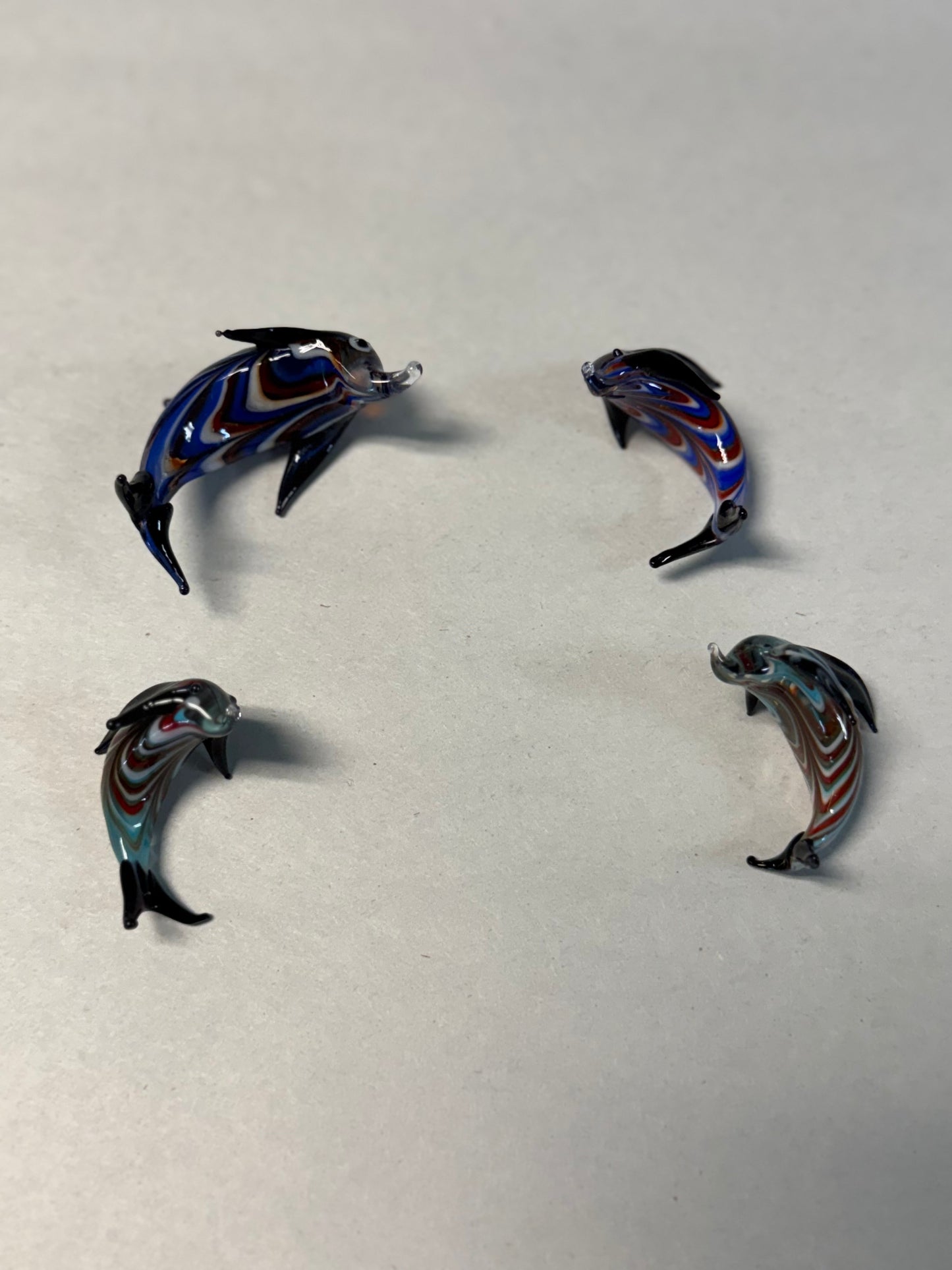Set of Four Hand-Blown Miniature Art Glass Dolphins