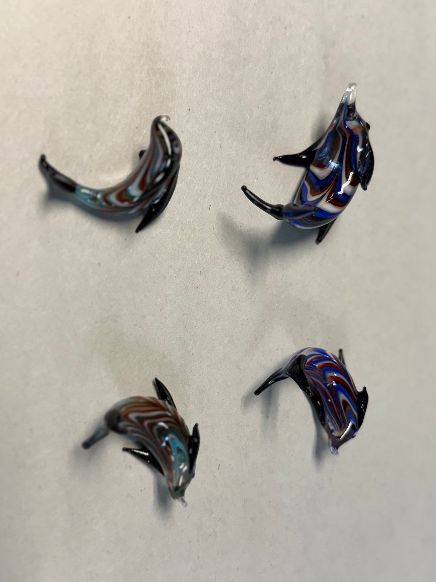 Set of Four Hand-Blown Miniature Art Glass Dolphins